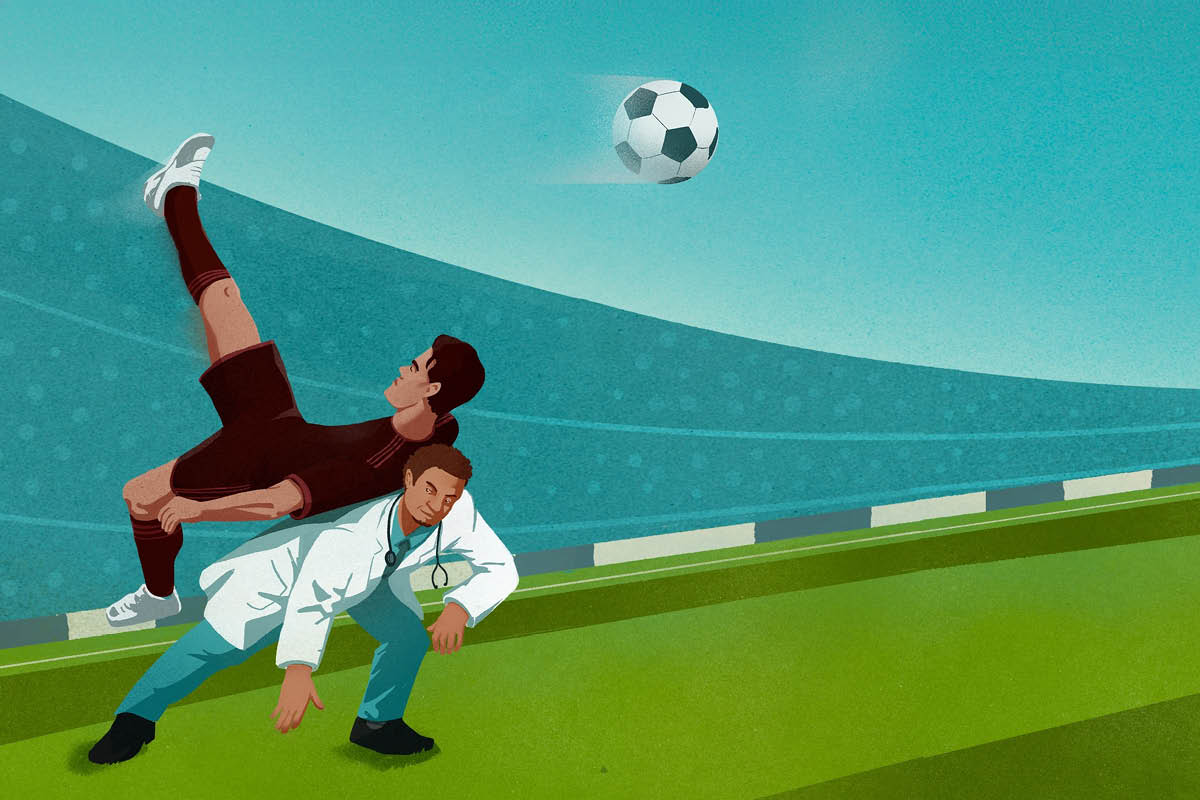 Doctor assisting soccer player